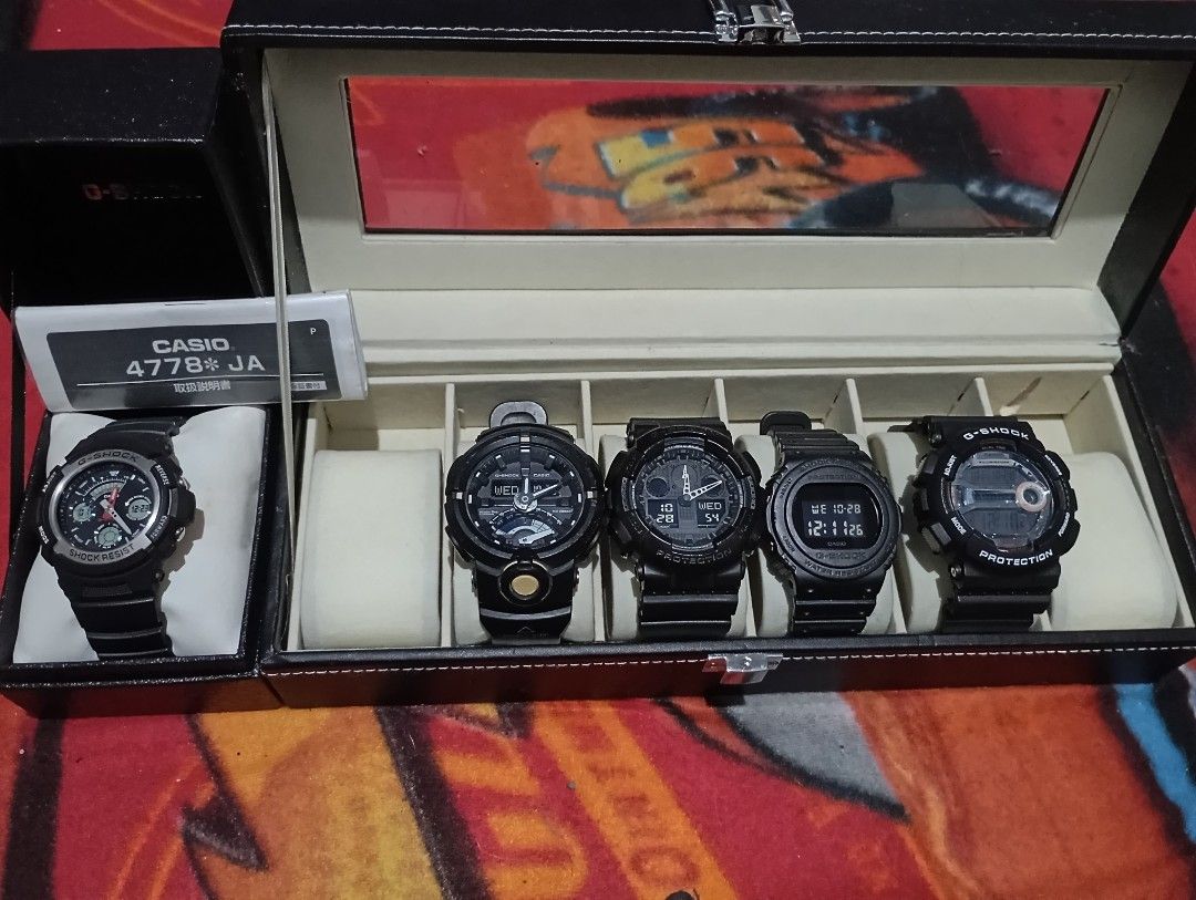 Casio G-Shock Digital & Analog Watch Collection (Category: Men's Watches) located in Manila. Submitted by jcaseanti (Listing ID 1470717872, Image 1). Description: - Brand: Casio G-Shock - Color: Classic Black - Build: Tough round resin cases & comfortable rubber straps - Features: Shock-resistant, water-resistant, digital-analog displays - Available Models: DW-5750E and more (check photos) - Options: Buy per piece or take the whole box - Conditio