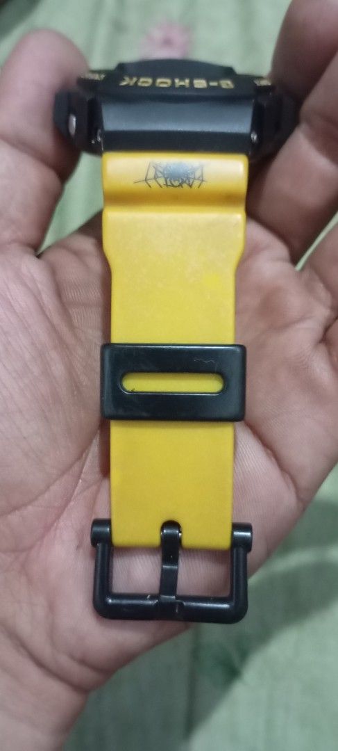 Casio G-Shock DW-6900 Fox Fire Yellow Black (Category: Men's Watches) located in Manila. Submitted by jhonevanma58082 (Listing ID 1470740874, Image 3). Description: - Model: Casio G-Shock DW-6900 Fox Fire digital watch - Colorway: Striking yellow and black design - Design: Unique spider web and skull graphics with strap text "G-SHOCK is dedicated to the soul foot in motion" - Display: Classic digital face equipped with EL backlight - Backplate: D