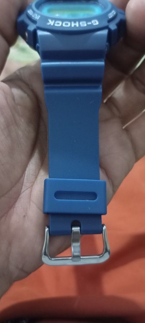 Casio G-Shock DW-6900CC Blue Digital Watch (Category: Men's Watches) located in Manila. Submitted by jhonevanma58082 (Listing ID 1470740832, Image 3). Description: - Model: Casio G-Shock DW-6900CC (Module 3230) - Color: Striking blue resin strap with secure metal buckle - Durability: Legendary shock-resistant construction - Water Resistance: Up to 20 bar / 200 meters - Display: EL backlight with vibrant green digital display - Backplate: Durable 