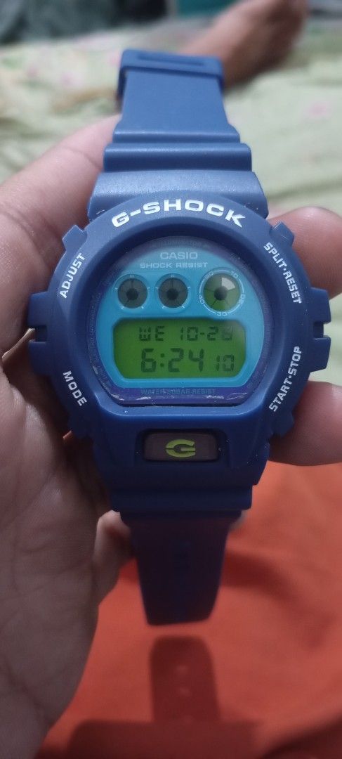 Casio G-Shock DW-6900CC Blue Digital Watch (Category: Men's Watches) located in Manila. Submitted by jhonevanma58082 (Listing ID 1470740832, Image 1). Description: - Model: Casio G-Shock DW-6900CC (Module 3230) - Color: Striking blue resin strap with secure metal buckle - Durability: Legendary shock-resistant construction - Water Resistance: Up to 20 bar / 200 meters - Display: EL backlight with vibrant green digital display - Backplate: Durable 