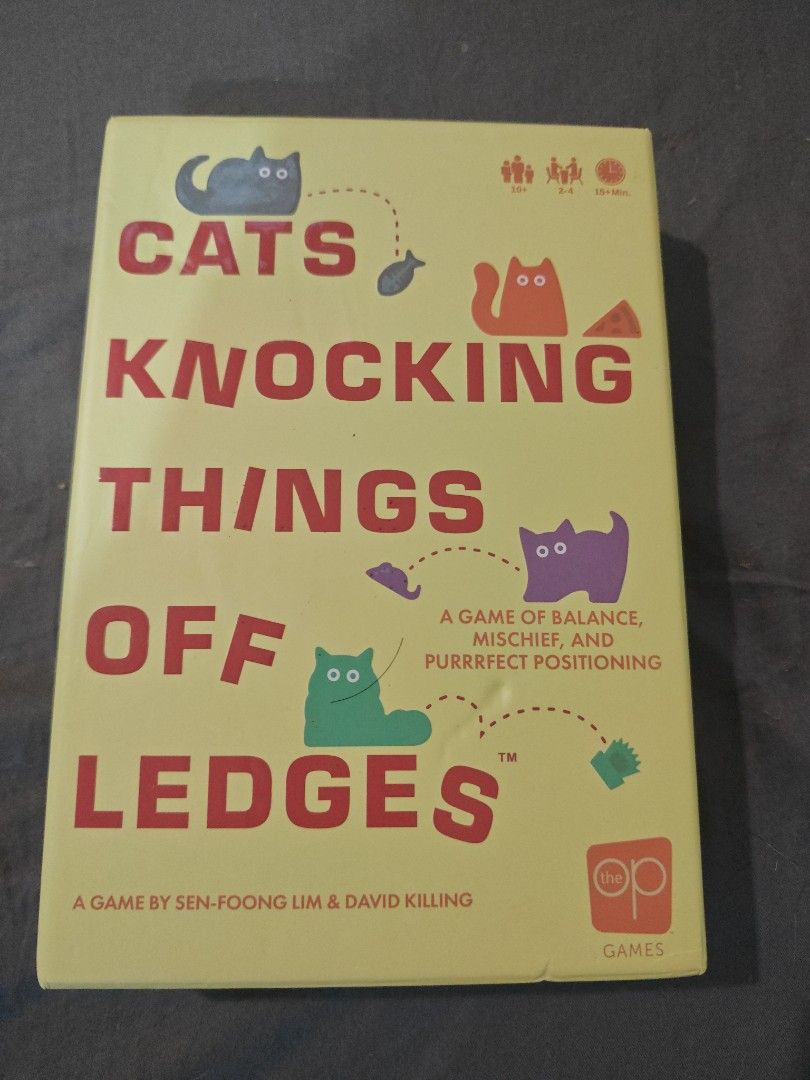 Cats Knocking Things Off Ledges Board Game The Op Games (Category: Board Games & Puzzles) located in Manila. Submitted by brianxu20 (Listing ID 1470640883, Image 1). Description: - Game: Cat-themed tabletop game about knocking things off ledges - Players: 2-4 players - Age: 10 years old and up - Play Time: Approx. 15 minutes - Creators: Sen-Foong Lim & David Killing - Publisher: The Op Games - Condition: Complete contents, light shelf wear on box