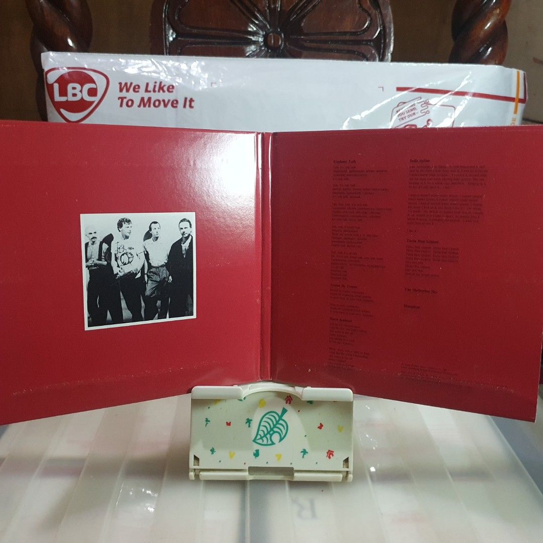 [CD] King Crimson Discipline Album (Category: CDs & DVDs) located in Quezon City. Submitted by collectionneursonline88 (Listing ID 1470572886, Image 2). Description: - Artist/Album: King Crimson - Discipline - Genre: Classic Rock - Key Tracks: Elephant Talk, Matte Kudasai, Frame by Frame, Indiscipline - Packaging: Red gatefold cover with band members photo inside and printed track list - Condition: Exterior shows some surface wear and minor scuff
