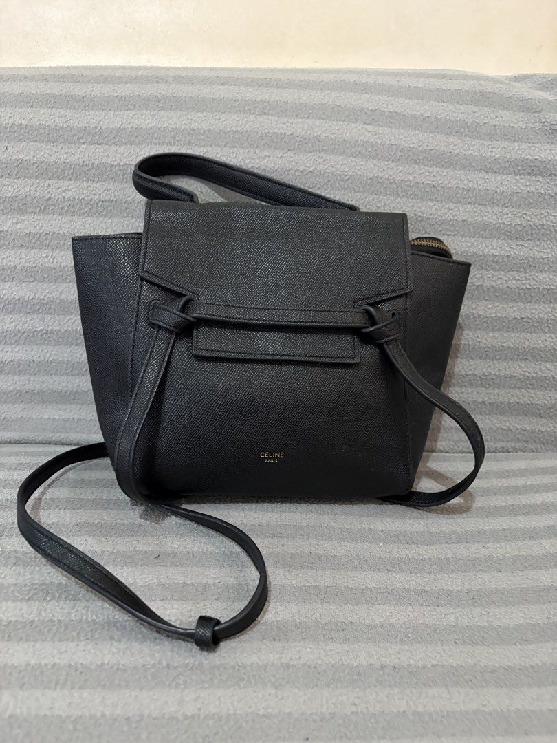 Celine Black Sling Bag (Category: Luxury Bags & Wallets) located in Pasig City. Submitted by mau_llamas (Listing ID 1470678863, Image 1). Description: - Brand: Celine - Color: Black - Material: Textured leather with suede interior lining - Hardware: Gold-tone - Features: Structured design, signature tied knot strap, top handle, and long adjustable shoulder strap - Branding: Gold foil Celine Paris stamping near the bottom - Condition: Clean exteri