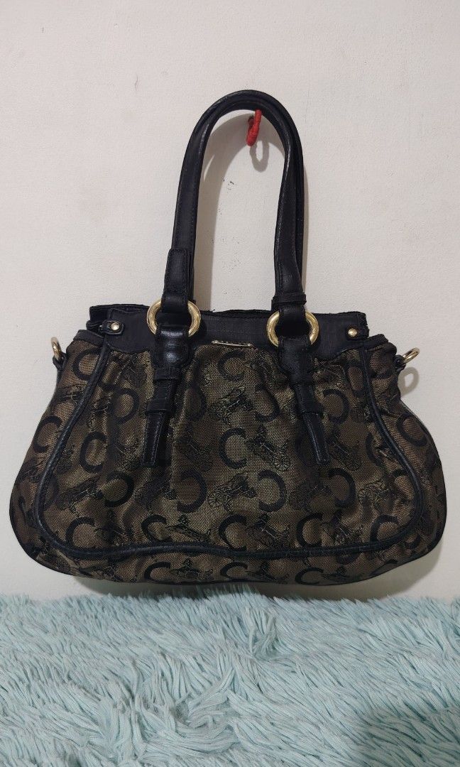 Celine C macadam handbags (Category: Luxury Bags & Wallets) located in Quezon City. Submitted by thriftmo19 (Listing ID 1470588088, Image 1). Description: Celine C macadam handbag Materials : leather and canvas No sling Main issue is tumigas yung leather. You can use leather condition if you want 1500 only.