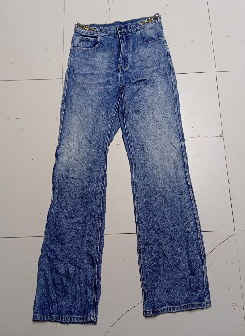 Celine Dylan Flared Denim Jeans Made in Japan (Category: Jeans) located in Calabanga. Submitted by youngbroke_7 (Listing ID 1470663148, Image 2). Description: - Brand: Celine - Origin: Made in Japan (LVMH Fashion Group Japan tagged) - Material: 100% cotton with a vintage washed finish - Fit: High-waisted, straight leg cut - Details: Chic gold-tone chain waist accent - Hardware: Premium Talon 45 zipper - Condition: Excellent buyer-ready piece.