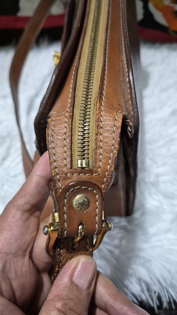 Celine Macadam Monogram Crossbody Bag (Category: Looking For) located in Baguio. Submitted by jhaz_bags (Listing ID 1470676032, Image 3). Description: - Authentic Celine crossbody bag in brown Macadam monogram coated canvas - Features chic tan leather trim and polished gold-tone hardware - Secure zippered top closure and iconic front square metal closure with Celine Paris engraving - Adjustable leather shoulder strap for a comfortable, custom fit
