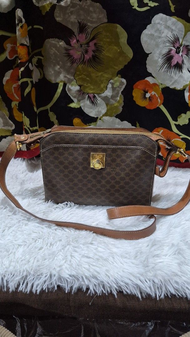 Celine Macadam Monogram Crossbody Bag (Category: Looking For) located in Baguio. Submitted by jhaz_bags (Listing ID 1470676032, Image 1). Description: - Authentic Celine crossbody bag in brown Macadam monogram coated canvas - Features chic tan leather trim and polished gold-tone hardware - Secure zippered top closure and iconic front square metal closure with Celine Paris engraving - Adjustable leather shoulder strap for a comfortable, custom fit