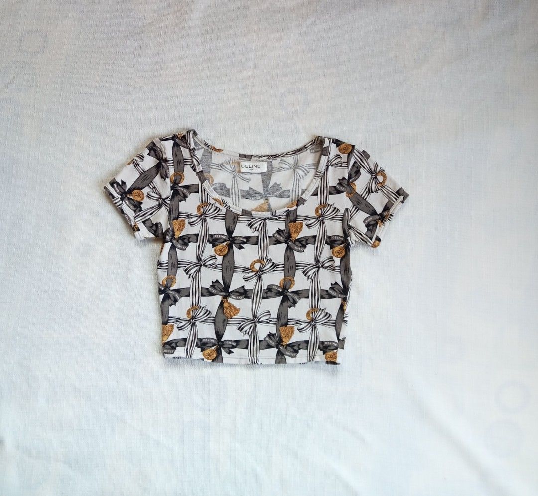 Celine Paris Ribbon Pattern Crop Top (Category: Shirts) located in Bagabag. Submitted by thrift_stories96 (Listing ID 1470703489, Image 1). Description: Celine Paris Ribbon Pattern Crop Top Xsmall to small frame Length - 13.5 Width - 13 stretch up to 16 Condition - excellent No flaw.