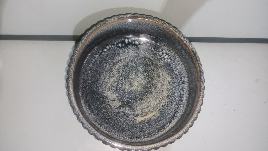 Ceramic Ikebana Pot Textured Blue White (Category: Pots & Planters) located in Munoz. Submitted by larryc1212 (Listing ID 1470631144, Image 3). Description: - Elegant blue and white glaze with a textured exterior and brownish rim detail - Dimensions: ~4.6 inches height, 7 inches diameter (ideal for medium indoor houseplants) - Heavy and sturdy ceramic build with a matching circular base stand - Beautiful dark speckled reactive glaze on the inside