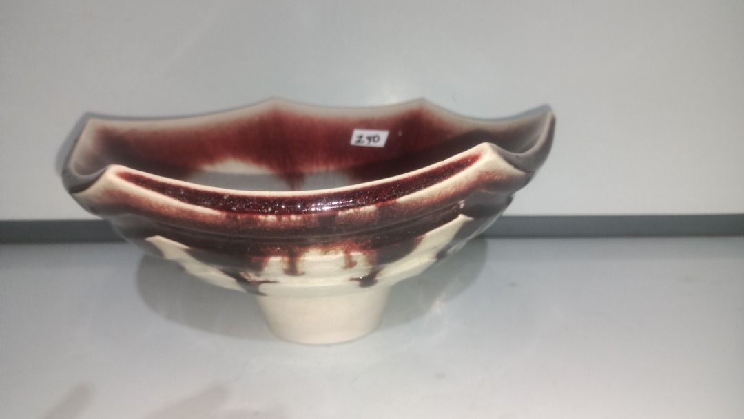Ceramic Octagonal Ikebana Decorative Bowl Red White Drip Glaze (Category: Vases & Decorative Bowls) located in Munoz. Submitted by larryc1212 (Listing ID 1470633880, Image 1). Description: - Product: Ceramic bowl with octagonal shape and pedestal base - Design: Eye-catching red and white drip glaze pattern inside and out - Dimensions: Roughly 9.5 inches opening diameter and 4.5 inches height - Condition: Minor wear marks on the base from previous