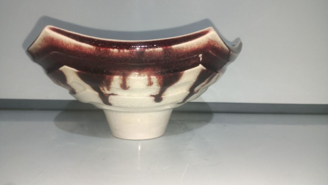Ceramic Octagonal Ikebana Decorative Bowl Red White Drip Glaze (Category: Vases & Decorative Bowls) located in Munoz. Submitted by larryc1212 (Listing ID 1470633880, Image 2). Description: - Product: Ceramic bowl with octagonal shape and pedestal base - Design: Eye-catching red and white drip glaze pattern inside and out - Dimensions: Roughly 9.5 inches opening diameter and 4.5 inches height - Condition: Minor wear marks on the base from previous