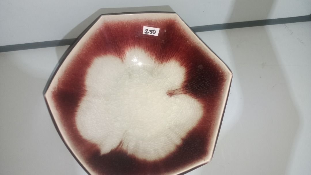Ceramic Octagonal Ikebana Decorative Bowl Red White Drip Glaze (Category: Vases & Decorative Bowls) located in Munoz. Submitted by larryc1212 (Listing ID 1470633880, Image 3). Description: - Product: Ceramic bowl with octagonal shape and pedestal base - Design: Eye-catching red and white drip glaze pattern inside and out - Dimensions: Roughly 9.5 inches opening diameter and 4.5 inches height - Condition: Minor wear marks on the base from previous
