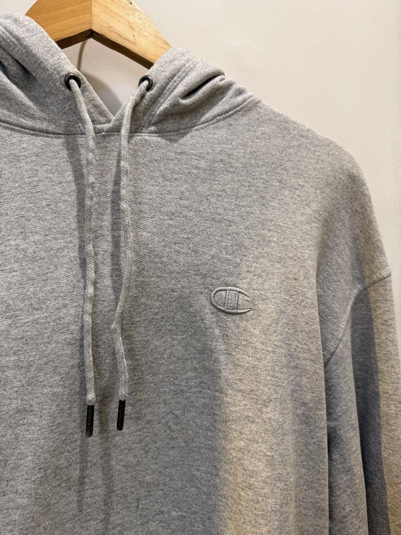Champion Grey Hoodie Sweatshirt Pullover (Category: Hoodies) located in Navotas City. Submitted by celinacupcupin (Listing ID 1470605397, Image 2). Description: No issue Like new Med on tag RFS: decluttering Loc: QC.