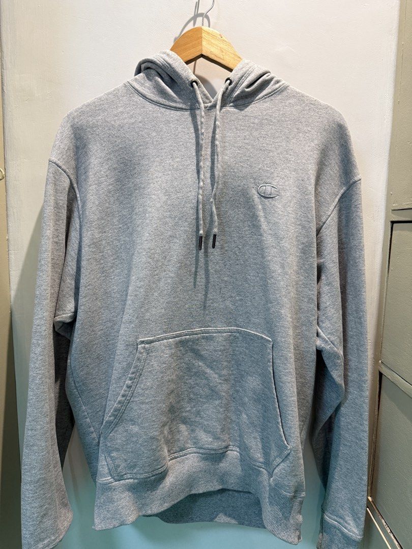 Champion Grey Hoodie Sweatshirt Pullover (Category: Hoodies) located in Navotas City. Submitted by celinacupcupin (Listing ID 1470605397, Image 1). Description: No issue Like new Med on tag RFS: decluttering Loc: QC.