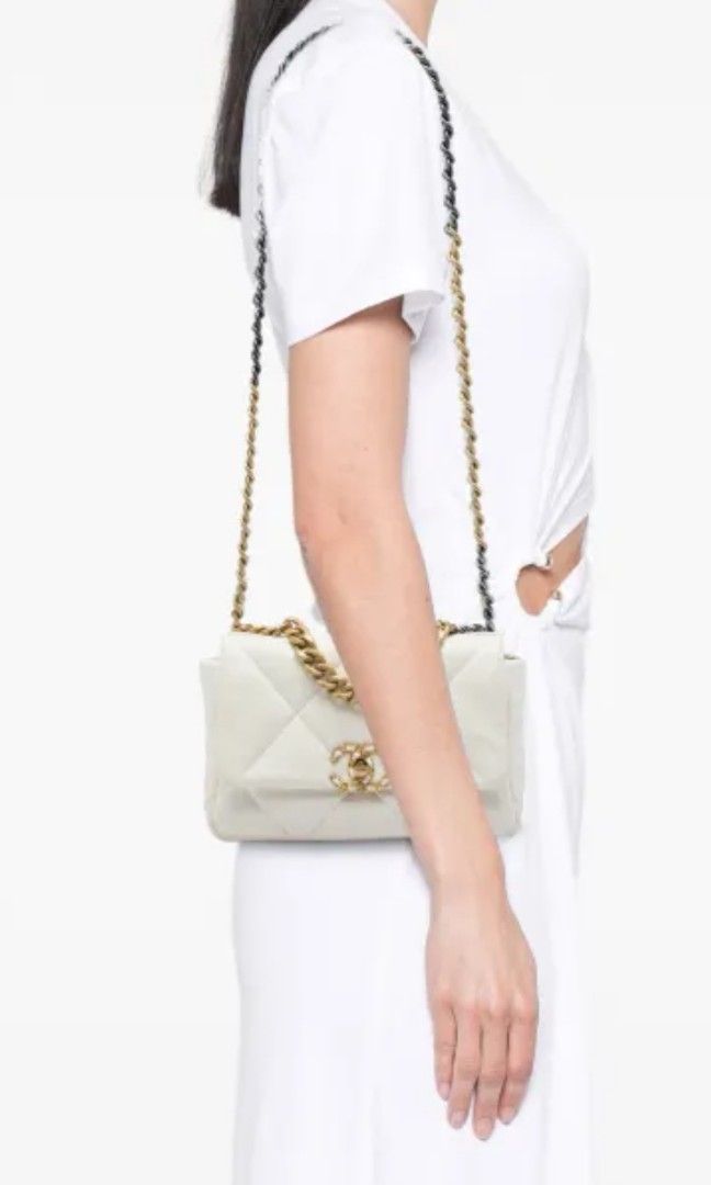 Chanel 19 Flap Bag White Quilted Leather (Category: Shoulder Bags) located in Caloocan City. Submitted by mylove326 (Listing ID 1470362533, Image 3). Description: - Bold quilted pattern with oversized diamonds - Mixed gold-tone chain and leather handle - Classic CC twist lock front closure - Soft structured shape for everyday elegance - Perfect luxury staple for daily use - Message us for more details and availability.