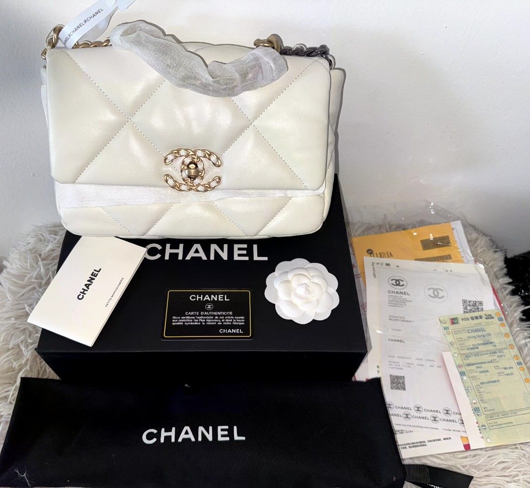 Chanel 19 Flap Bag White Quilted Leather (Category: Shoulder Bags) located in Caloocan City. Submitted by mylove326 (Listing ID 1470362533, Image 1). Description: - Bold quilted pattern with oversized diamonds - Mixed gold-tone chain and leather handle - Classic CC twist lock front closure - Soft structured shape for everyday elegance - Perfect luxury staple for daily use - Message us for more details and availability.