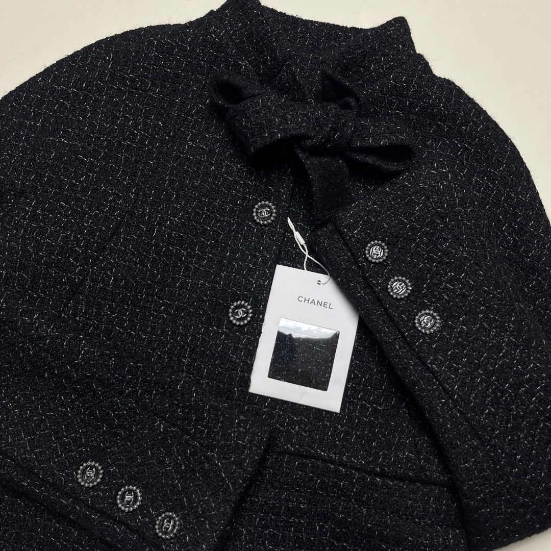 Chanel Black Tweed Bow Jacket Size 36 (Category: Coats, Jackets and Outerwear) located in Caloocan City. Submitted by achilles_grails (Listing ID 1470579156, Image 2). Description: - Features a chic high collar and built-in front bow tie detail - Signature pearl-rimmed CC logo buttons on the front and cuffs - Fully lined with luxurious black silk - Size: 36 - Condition: Brand new with tag attached - Perfect for formal events, workwear, or elevati