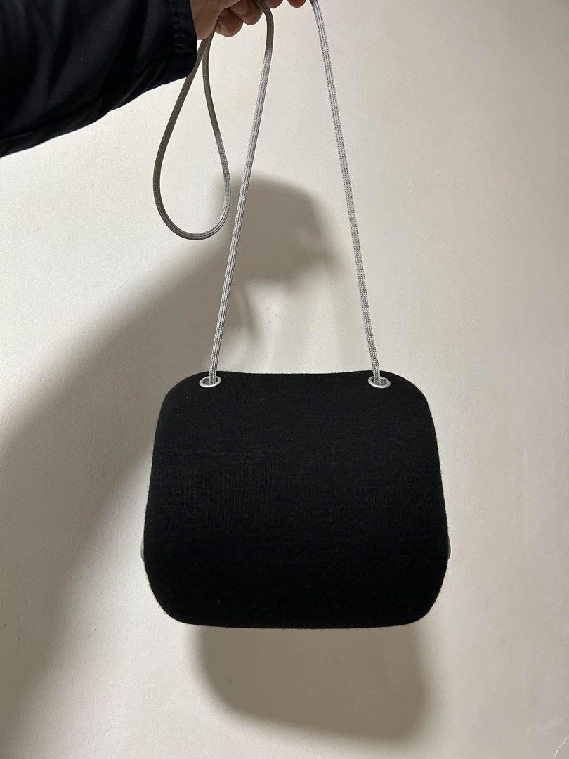 Chanel Black Wool Crossbody Bag with Silver Hardware (Category: Cross-body Bags) located in Manila. Submitted by calvinomateo14 (Listing ID 1470569208, Image 3). Description: - Brand: Chanel - Material: Black wool with black satin lining - Hardware: Silver-tone metal handles and CC logo plaque - Style: Structured crossbody with curved sides and woven shoulder strap - Interior: Includes divider pockets - Inclusions: Original authenticity card and 