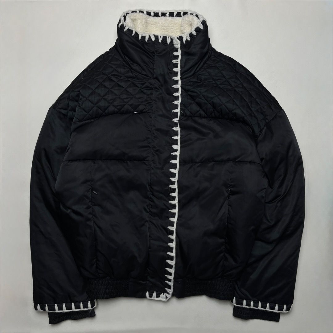 Chanel Coco Neige Black Down Puffer Jacket (Category: Coats, Jackets and Outerwear) located in Caloocan City. Submitted by achilles_grails (Listing ID 1470578345, Image 1). Description: - Brand: Chanel Coco Neige - Color: Classic Black with Contrast White Details - Design: Quilted upper shoulders, white contrast stitching, and plush white sherpa fleece collar - Branding: CC logo branded zipper pulls and snap buttons, plus Coco Neige shield patch 
