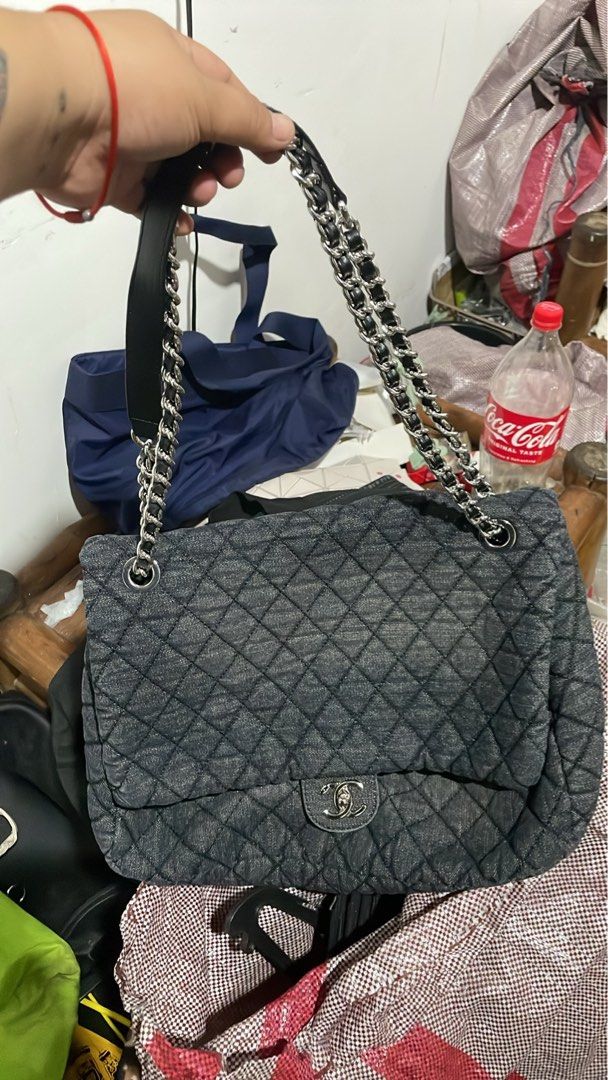 Chanel Denim Quilted Flap Shoulder Bag (Category: Shoulder Bags) located in Santiago. Submitted by UkayLuxxSelector (Listing ID 1470711454, Image 1). Description: - Chanel Quilted Denim Shoulder Bag - Dark wash blue fabric with classic diamond stitching - Silver-tone hardware with bright metallic finish - Signature CC twist-lock front flap closure - Chain straps interwoven with leather plus a comfortable leather shoulder guard - Structured rectan