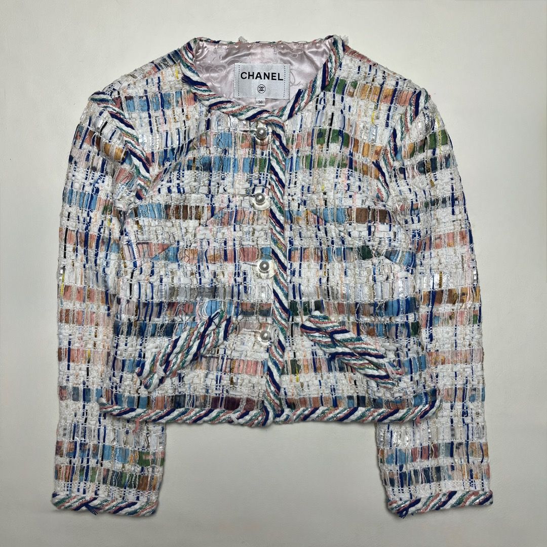 Chanel Multicolor Tweed Jacket Size 36 (Category: Coats, Jackets and Outerwear) located in Caloocan City. Submitted by achilles_grails (Listing ID 1470593992, Image 1). Description: - Brand: Chanel (Made in France) - Style: Tweed jacket with multicolored pattern on white background - Size: 36 - Design: Round neckline, button-front closure, and two front pockets - Lining: 100% pink silk with subtle pattern - Materials: Premium blend (polyester, co