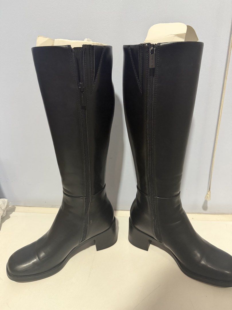 Charles & Keith Black Knee High Boots (Category: Boots) located in Quezon City. Submitted by roseela (Listing ID 1470678135, Image 3). Description: - Charles & Keith knee high boots - Size 36 (23cm) - RFS : tight on my calfs.