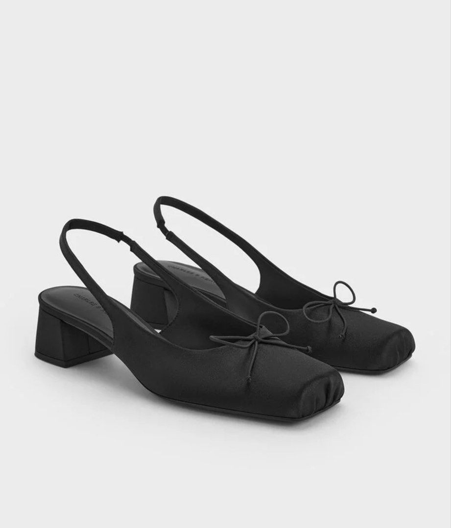 Charles & Keith Slingback S38 (Category: Heels) located in Makati City. Submitted by refind.prelove.finds (Listing ID 1470648807, Image 2). Description: Satin bow square-toe slingback pumps Material: Satin Size: 38 Color: Black With box.