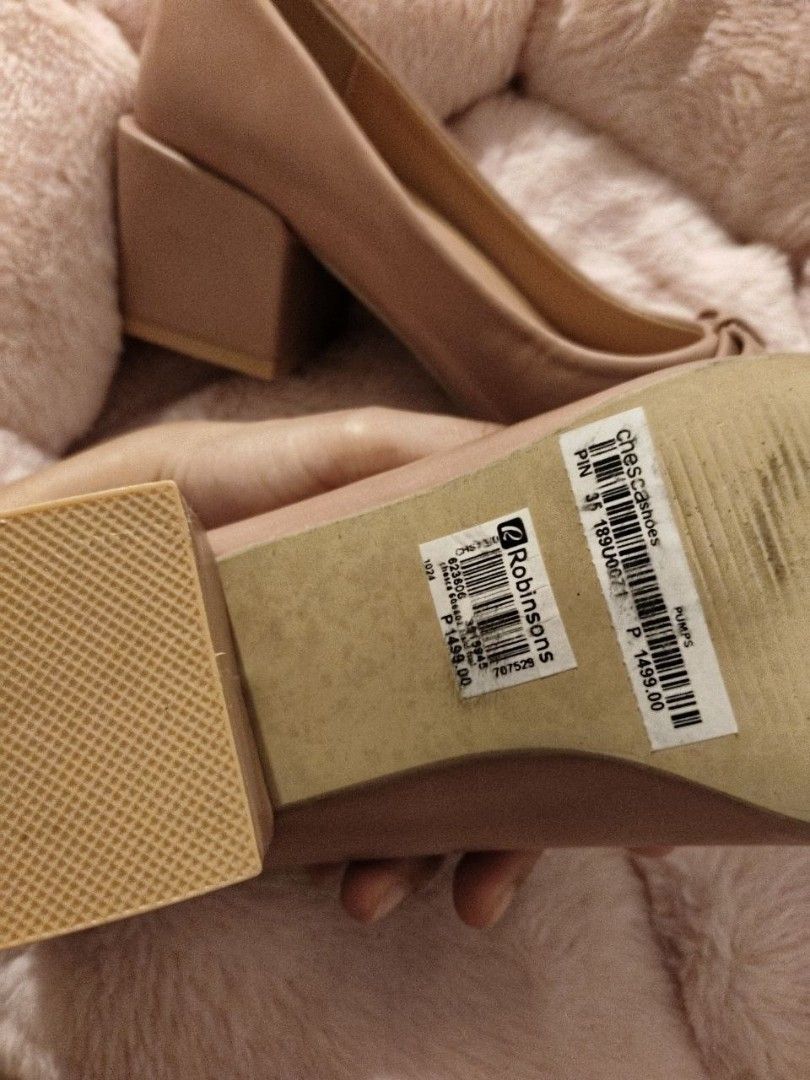 Chesca Nude Block Heel Pumps Size 35 (Category: Heels) located in Bacoor. Submitted by ksyoungieberries (Listing ID 1470693208, Image 3). Description: - Brand: Chesca - Style: Nude pumps with block heels and bow cutout toe details - Size: 35 - Condition: Brand new, never worn out (original Robinsons price tag still attached) - Original Price: ₱1,499.