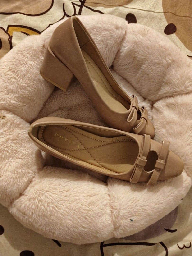 Chesca Nude Block Heel Pumps Size 35 (Category: Heels) located in Bacoor. Submitted by ksyoungieberries (Listing ID 1470693208, Image 1). Description: - Brand: Chesca - Style: Nude pumps with block heels and bow cutout toe details - Size: 35 - Condition: Brand new, never worn out (original Robinsons price tag still attached) - Original Price: ₱1,499.