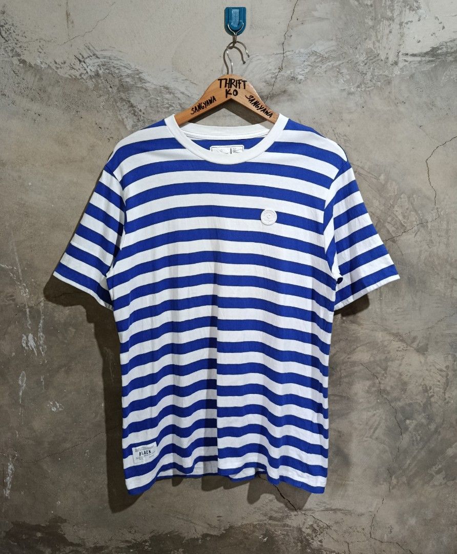 :CHOCOOLATE Blue White Striped T-Shirt XL (Category: Tshirts & Polo Shirts ) located in Kalamansig. Submitted by skone1996 (Listing ID 1470558167, Image 1). Description: - Brand::CHOCOOLATE - Size: XL - 21 Width - 28 Length - 9.8/10 Color rate - No issue - Color: Blue and white horizontal stripes - Design: Short sleeves, crew neck, rubberized brand patch on chest, woven label near lower hem - Condition: Clean fabric with interior collar and care 