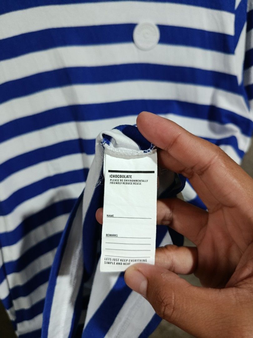 :CHOCOOLATE Blue White Striped T-Shirt XL (Category: Tshirts & Polo Shirts ) located in Kalamansig. Submitted by skone1996 (Listing ID 1470558167, Image 3). Description: - Brand::CHOCOOLATE - Size: XL - 21 Width - 28 Length - 9.8/10 Color rate - No issue - Color: Blue and white horizontal stripes - Design: Short sleeves, crew neck, rubberized brand patch on chest, woven label near lower hem - Condition: Clean fabric with interior collar and care 