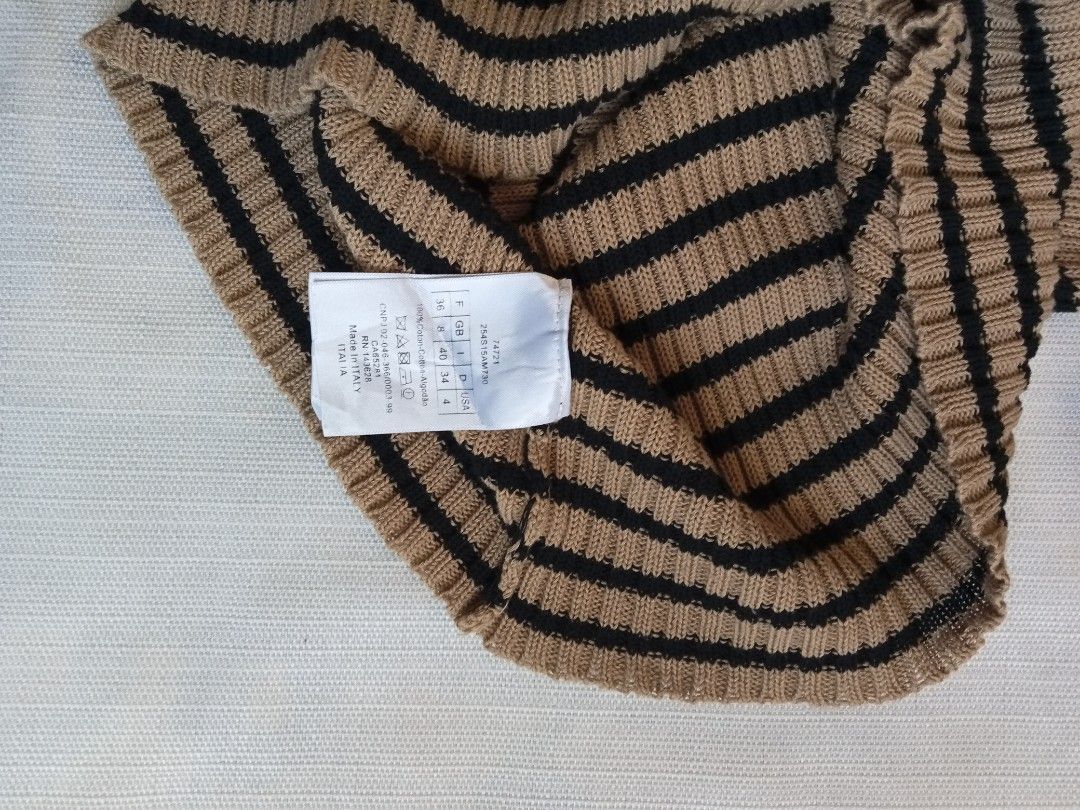 Christian Dior striped brown knitted top (Category: Shirts) located in Bagabag. Submitted by thrift_stories96 (Listing ID 1470706094, Image 3). Description: Christian Dior striped brown knitted top Small to medium frame Length - 22.5 Width - 12.5 stretch up to 16 Condition - 9/10 Color and cloth - 9.5/10 Flaw - remove necktag.