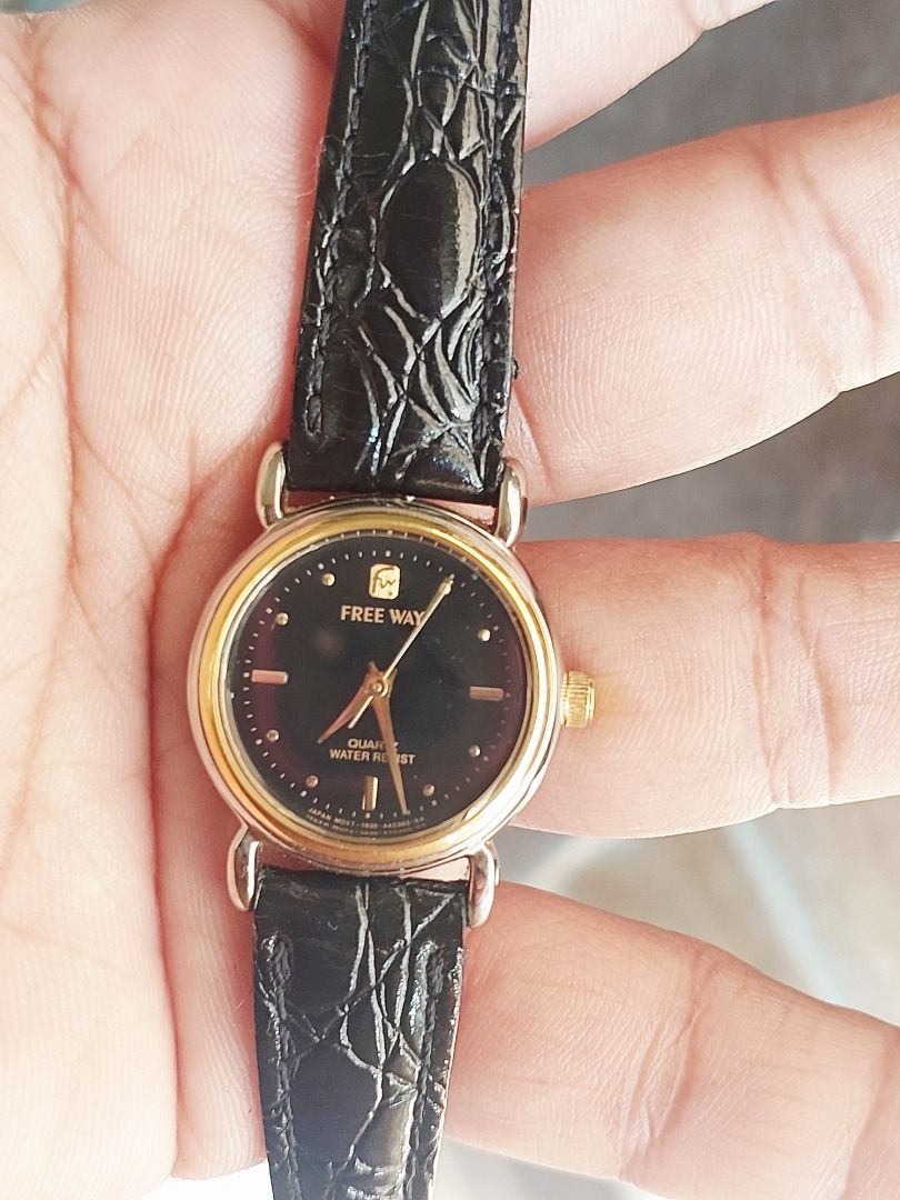 Citizen Free Way Quartz Watch (Category: Women's Watches) located in Batangas. Submitted by vintageanddainty (Listing ID 1470588350, Image 1). Description: - Brand/Model: Citizen Free Way (Model: 7630-A41831 HIW) - Movement: Quartz (battery-operated) - Dial: Black textured face with elegant gold-tone accents - Case: Two-tone silver and gold base metal case with round face - Strap: Black textured faux leather strap with secure buckle closure - Fea