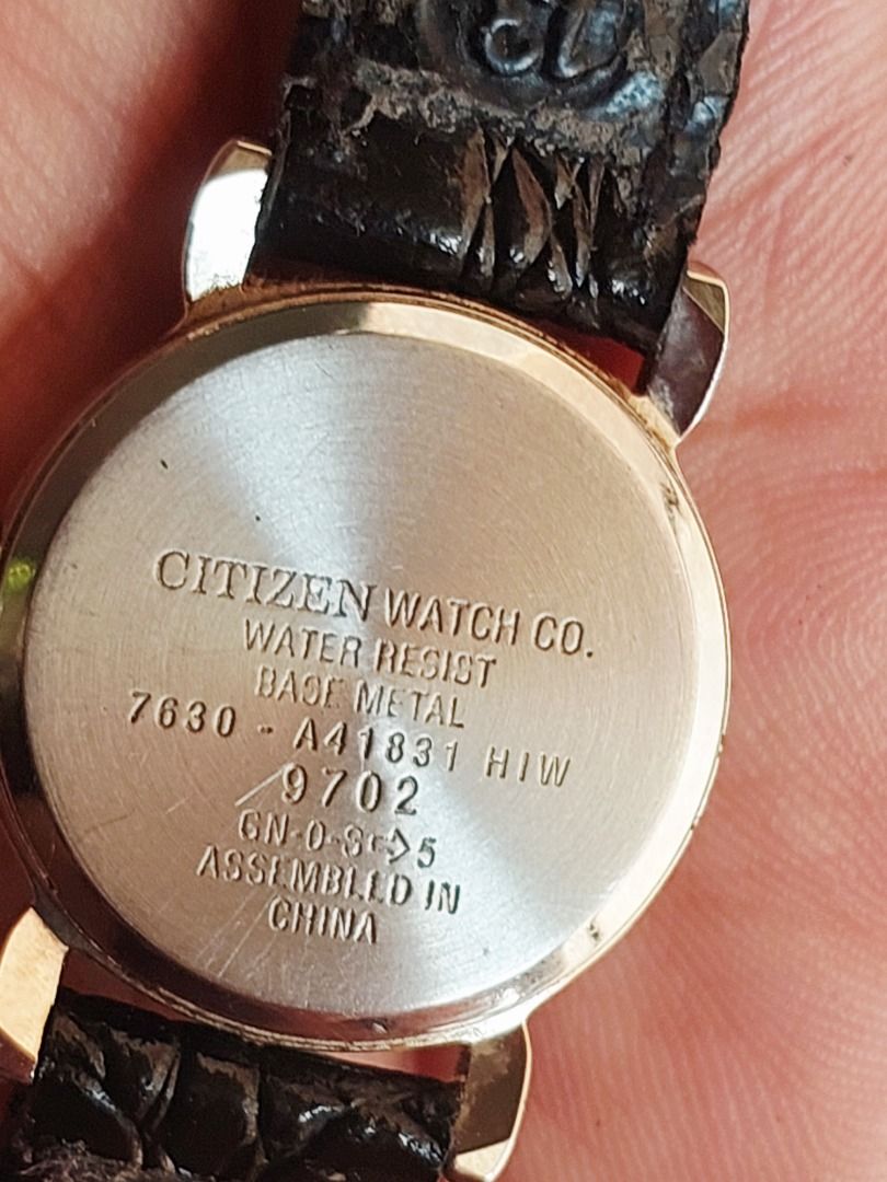 Citizen Free Way Quartz Watch (Category: Women's Watches) located in Batangas. Submitted by vintageanddainty (Listing ID 1470588350, Image 3). Description: - Brand/Model: Citizen Free Way (Model: 7630-A41831 HIW) - Movement: Quartz (battery-operated) - Dial: Black textured face with elegant gold-tone accents - Case: Two-tone silver and gold base metal case with round face - Strap: Black textured faux leather strap with secure buckle closure - Fea