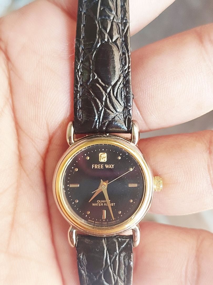 Citizen Free Way Quartz Watch (Category: Women's Watches) located in Batangas. Submitted by vintageanddainty (Listing ID 1470588350, Image 2). Description: - Brand/Model: Citizen Free Way (Model: 7630-A41831 HIW) - Movement: Quartz (battery-operated) - Dial: Black textured face with elegant gold-tone accents - Case: Two-tone silver and gold base metal case with round face - Strap: Black textured faux leather strap with secure buckle closure - Fea