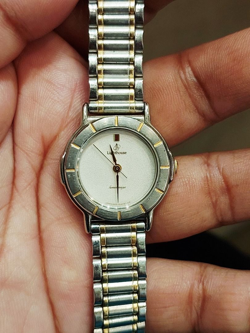 Citizen Lighthouse Two-Tone Analog Watch (Category: Women's Watches) located in Batangas. Submitted by vintageanddainty (Listing ID 1470583402, Image 1). Description: - Brand: Citizen - Design: Two-tone silver and gold stainless steel bracelet - Dial: Round white dial with elegant gold-tone hands and hour markers - Bezel: Textured design with alternating silver and gold segments - Fit: Standard wrist size - Style: Classic and versatile everyday a