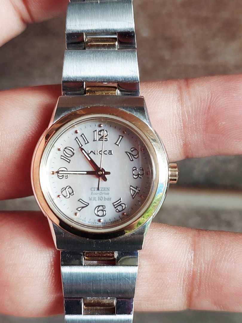 Citizen Wicca Eco-Drive Two-Tone Watch (Category: Women's Watches) located in Batangas. Submitted by vintageanddainty (Listing ID 1470582367, Image 2). Description: - Brand/Model: Citizen Wicca Women's Watch - Design: Two-tone silver and gold stainless steel case and bracelet - Dial: Mother of pearl with classic Arabic numeral hour markers - Movement: Eco-Drive solar-powered (no battery replacements required) - Water Resistance: 10 bar (suitable 