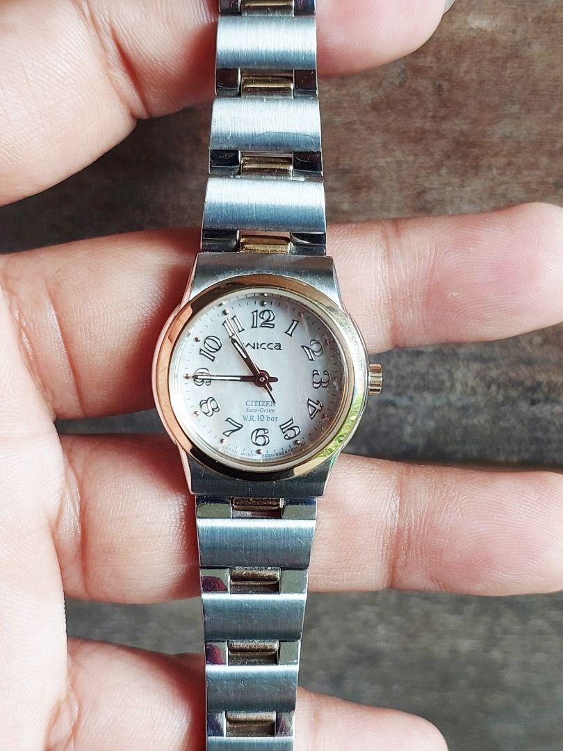 Citizen Wicca Eco-Drive Two-Tone Watch (Category: Women's Watches) located in Batangas. Submitted by vintageanddainty (Listing ID 1470582367, Image 1). Description: - Brand/Model: Citizen Wicca Women's Watch - Design: Two-tone silver and gold stainless steel case and bracelet - Dial: Mother of pearl with classic Arabic numeral hour markers - Movement: Eco-Drive solar-powered (no battery replacements required) - Water Resistance: 10 bar (suitable 