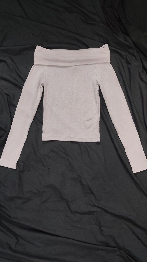 Clockhouse Off-Shoulder Long Sleeve Top XS (Category: Longsleeves) located in Makati City. Submitted by beedg (Listing ID 1470708213, Image 1). Description: - Brand: Clockhouse(by C&A) - Style: Off-shoulder long sleeve top with a folded collar neckline and fitted silhouette - Color: Dusty Purple - Size: XS - Material: Soft ribbed knit (comfortable for everyday wear) - Condition: Great basic piece, clean tag inside - Origin: Hungary .