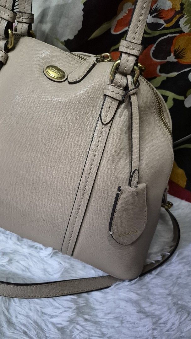 Coach beige leather satchel shoulder bag (Category: Looking For) located in Baguio. Submitted by jhaz_bags (Listing ID 1470680993, Image 3). Description: - Brand: Coach - Style: Satchel bag - Color: Beige with gold-tone hardware - Material: Crosshatch leather - Features: Dual top handles, detachable shoulder strap, zip-top closure, interior fabric lining with slip and zip pockets - Origin: Made in Vietnam - Condition: Exterior handles show minor 