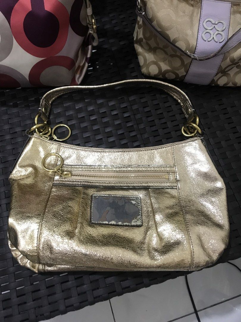 Coach bundle (Category: Shoulder Bags) located in Balete No 2. Submitted by troyesybang (Listing ID 1470595687, Image 2). Description: Mix use well use heavily used Take all No cod cop Sf j&t only Fix lp All OG coach Yun small may sira leather handle yun violet Yun gold may tipak sira damage na yun square sa gitna at patch loob yun body like new pa yun bilog bilog na tela satin good used may konti pens marks insodeb Vawal sa maarte maselan Availa