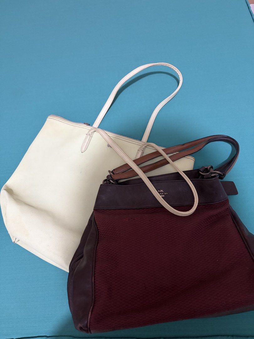 Coach Burgundy and Lacoste Green (Category: Luxury Bags & Wallets) located in Virac. Submitted by stabarbati50409 (Listing ID 1470667165, Image 1). Description: - 2-in-1 bag bundle for everyday use - Bag 1: Large cream canvas tote with thin straps and spacious interior - Bag 2: Burgundy textured fabric with brown leather trim, metal hardware, and stamped Coach horse and carriage logo - Both feature ample storage space - Pre-loved and ready for a 