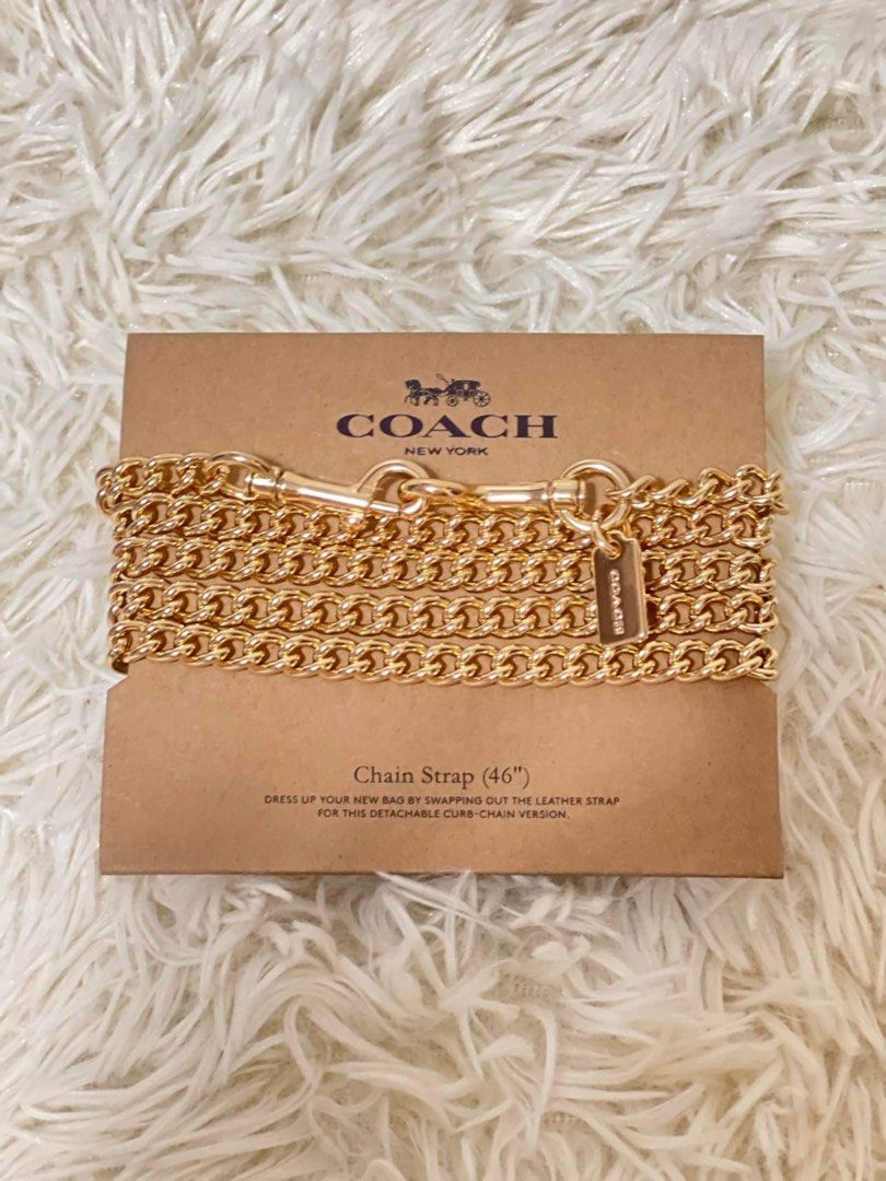 Coach Gold 46" Curb-Chain Bag Strap (Category: Shoulder Bags) located in Lapu Lapu. Submitted by Tinay (Listing ID 1470593688, Image 1). Description: Last one - Authentic Coach curb-chain bag strap in shiny gold hardware - Length: 46 inches, perfect for shoulder or crossbody wear - Features secure clasp closures on both ends for easy detachment - Includes the cute little Coach hangtag near the clasp - Brand new with original branded cardboard bac