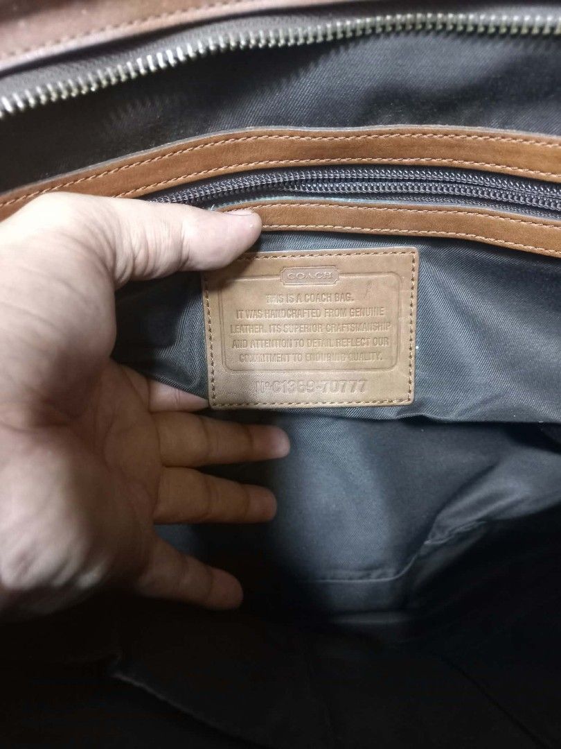 Coach Leather Laptop Briefcase Brown (Category: Briefcases) located in Quezon City. Submitted by dei03_diz (Listing ID 1470632336, Image 3). Description: - Authentic Coach leather briefcase in rich brown - Dual compartments with smooth zip closures and front slip pocket with debossed logo - Interior includes fabric lining, zip pocket, and creed patch (Serial: C1369-70777) - Sturdy top handles for easy carrying - Heavy scuffs, scratches, and authe