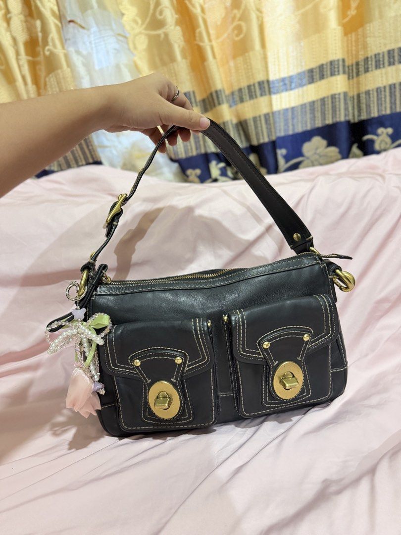 Coach Legacy Turnlock (Category: Shoulder Bags) located in San Francisco. Submitted by chicpickcloset_ (Listing ID 1470725678, Image 1). Description: Please read‼️ - 9/10 - Good Condition - Intact Rubber Lining - No rubs - yung issue nya lang po is (No hangtag, and may pen marks unti sa loob, need sya iclean) - Super steal na din sa price since 30k up tung bentahan sa mga ganito na style🥹.