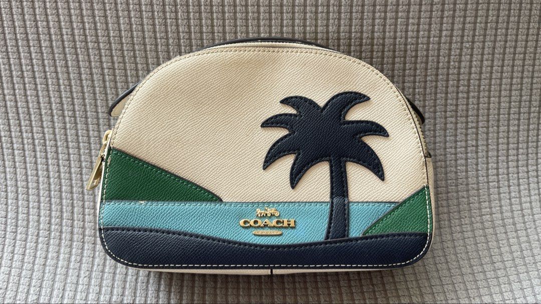 Coach Serena Satchel with Sunset Motif (Category: Cross-body Bags) located in Manila. Submitted by xyrilleprix (Listing ID 1470631903, Image 1). Description: - Authentic Coach - Comes with an adjustable and detachable leather strap with gold lobster clasps - Excellent condition, needs thorough cleaning loc/meet up: Tagaytay.