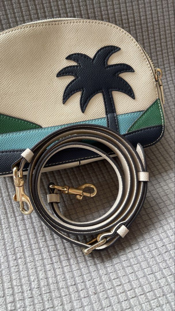 Coach Serena Satchel with Sunset Motif (Category: Cross-body Bags) located in Manila. Submitted by xyrilleprix (Listing ID 1470631903, Image 3). Description: - Authentic Coach - Comes with an adjustable and detachable leather strap with gold lobster clasps - Excellent condition, needs thorough cleaning loc/meet up: Tagaytay.