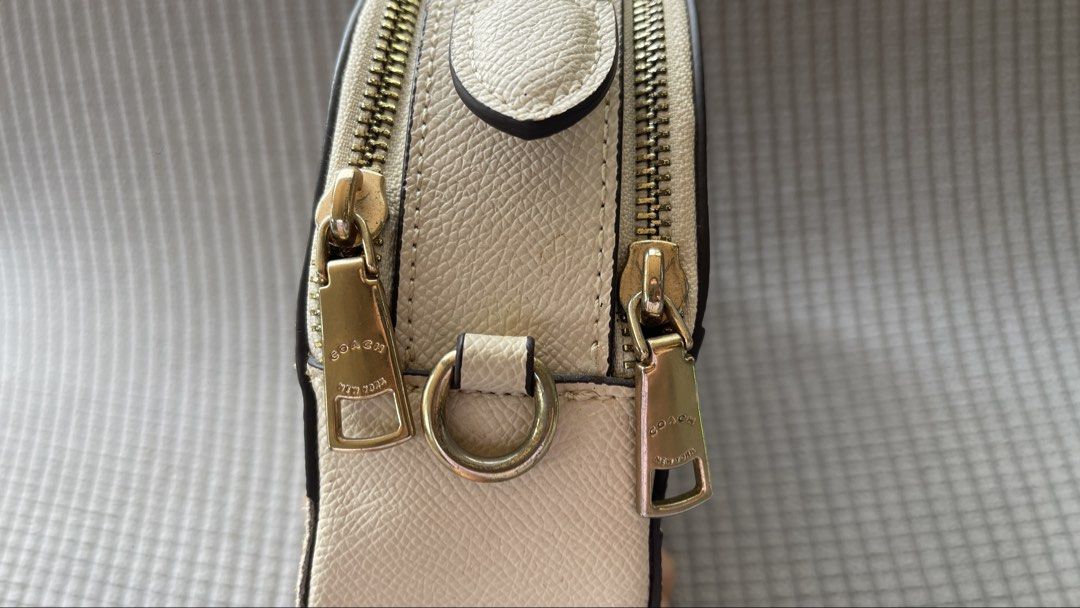 Coach Serena Satchel with Sunset Motif (Category: Cross-body Bags) located in Manila. Submitted by xyrilleprix (Listing ID 1470631903, Image 2). Description: - Authentic Coach - Comes with an adjustable and detachable leather strap with gold lobster clasps - Excellent condition, needs thorough cleaning loc/meet up: Tagaytay.