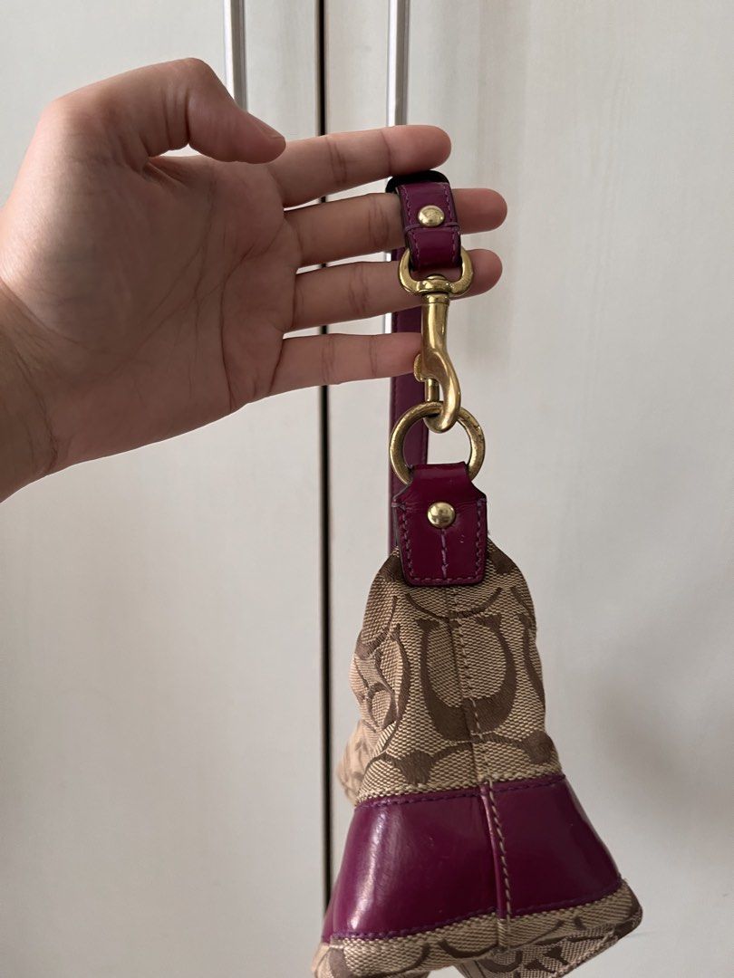Coach Signature C Stripe Shoulder Bag (Category: Luxury Bags & Wallets) located in Quezon City. Submitted by blesshie_ (Listing ID 1470583591, Image 3). Description: - Brand: Coach - Material: Signature C canvas with pink patent leather trim - Hardware: Gold-tone - Closure: Zip top with round Coach medallion pull and clasp strap - Interior: Colorful striped satin lining - Authenticity: Includes leather creed patch with serial number E0868-41642; 