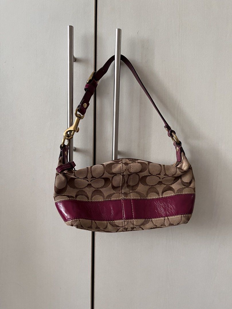 Coach Signature C Stripe Shoulder Bag (Category: Luxury Bags & Wallets) located in Quezon City. Submitted by blesshie_ (Listing ID 1470583591, Image 1). Description: - Brand: Coach - Material: Signature C canvas with pink patent leather trim - Hardware: Gold-tone - Closure: Zip top with round Coach medallion pull and clasp strap - Interior: Colorful striped satin lining - Authenticity: Includes leather creed patch with serial number E0868-41642; 